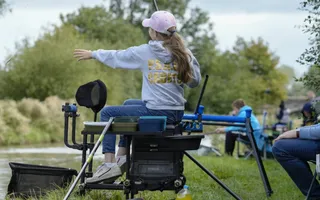 Penny landing a fish