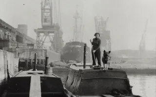 Old photo of two narrowboats at the Regent's Canal Dock