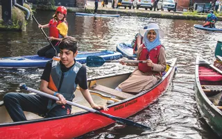 Canoeists having fun on the canal