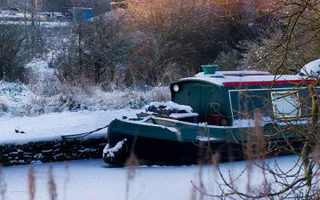 A boat moored in the snow