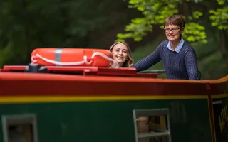 Woman steers a hire boat